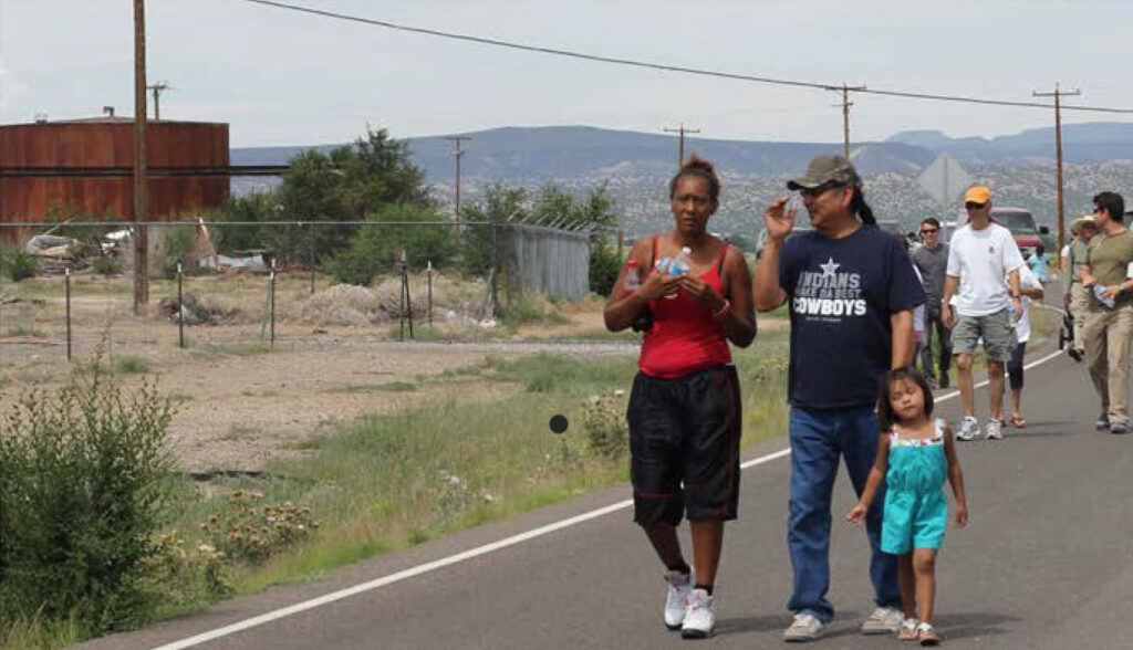 Image of family walking down a pedestrian trail